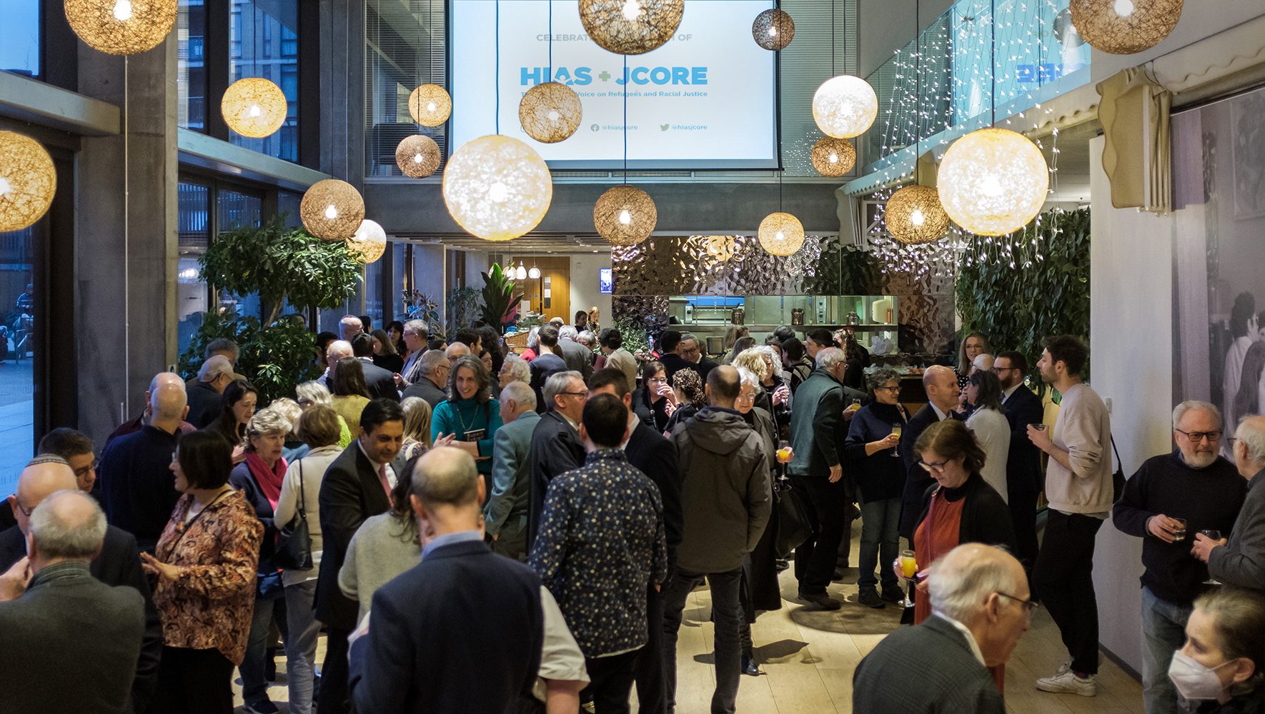Guests enjoy a reception following the HIAS+JCORE launch event