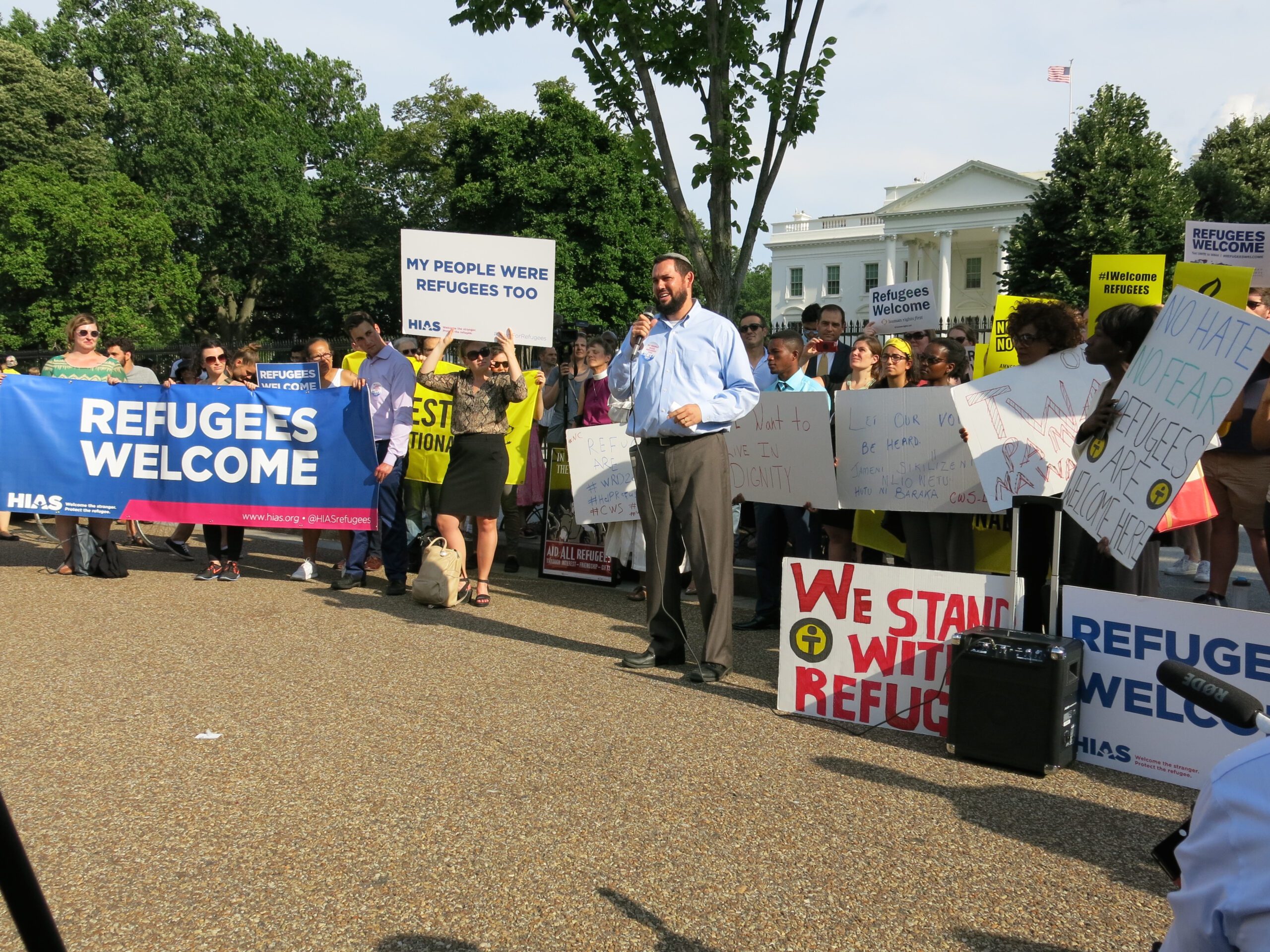 Rabbi Uri Topolosky of Beth Joshua Congregation joins a gathering of refugees, advocates, and faith leaders at a World Refugee Day rally co-sponsored by HIAS on June 20, 2017, in front of the White House. | Congregational Opportunities | How Do Communities Support Refugees | HIAS