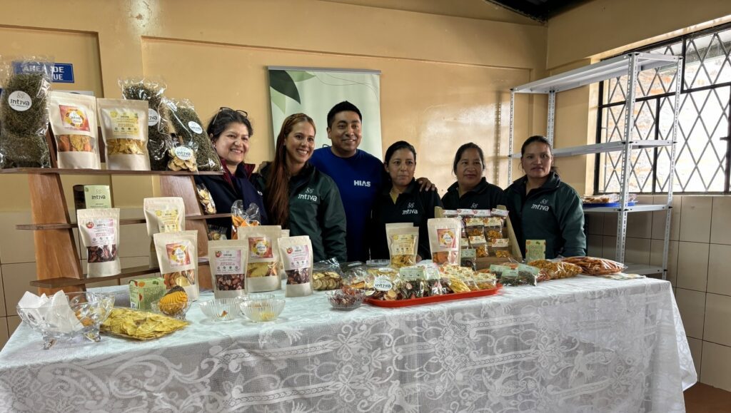 Women-led agribusiness Intiva, which produces herbal teas and dehydrated fruits, tables at a community event in Carchi in Tulcán on September 10, 2025. (Emily Primack and Lauren Pach/HIAS).