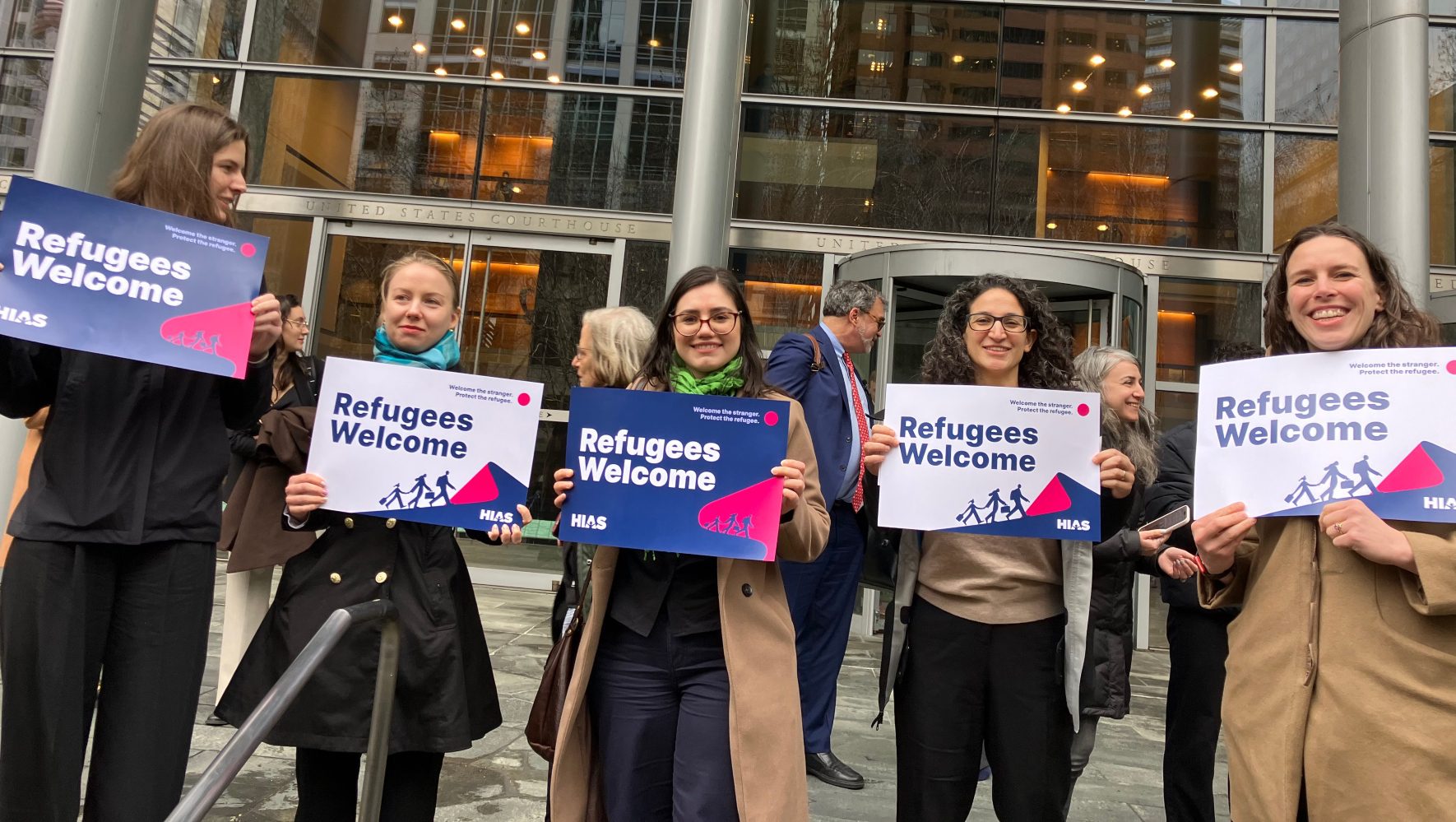 HIAS supporters gather outside a courthouse in Seattle to celebrate the court ruling that blocked the Trump administration’s executive order suspending the U.S. Refugee Admissions Program (USRAP).