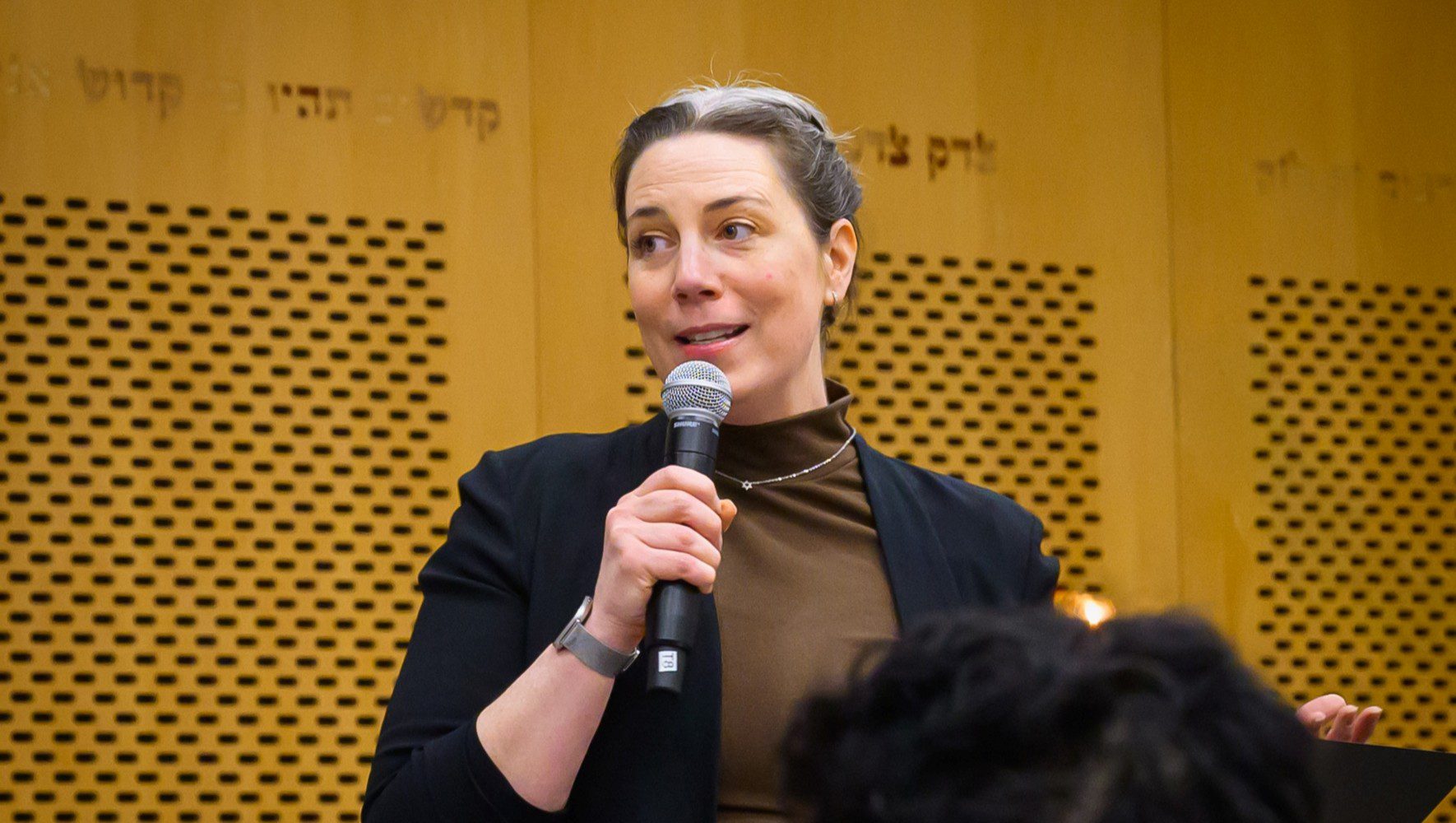 HIAS' Rabbi-in-Residence Sarah Bassin speaks at Temple Israel of Hollywood for HIAS' eighth annual Refugee Shabbat on March 13, 2026 (Andy Romanoff for Temple Israel).