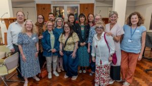 HIAS+JCORE awards Finchley Progressive Synagogue as the U.K.'s first Synagogue of Sanctuary on June 16, 2026 in London, featuring HIAS+JCORE's Rabbi David Mason, former Syrian refugee and community leader Alaa, and FPS' Tamara Joseph. (David Lewis).