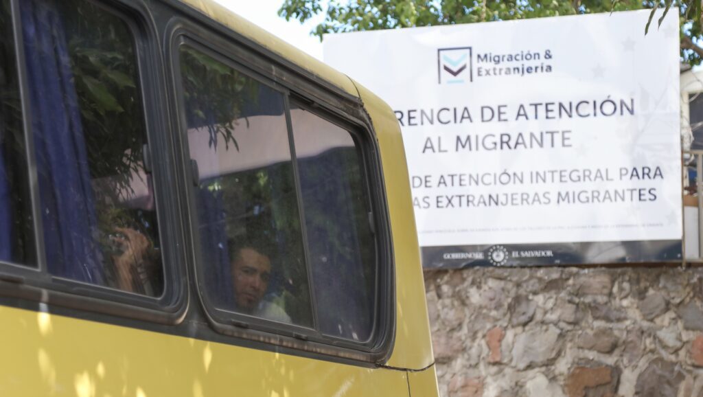 Deported people looking for relatives from the windows of a transport during the arrival of a group of Salvadorans deported from the United States to the Migrant Care Management Office (GAMI), in San Salvador, El Salvador on February 12, 2025. (Alex Pena/Anadolu via Getty Images