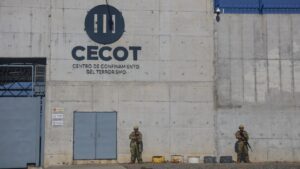 Soldiers guarding the entrance at maximum security penitentiary CECOT (Center for the Compulsory Housing of Terrorism).