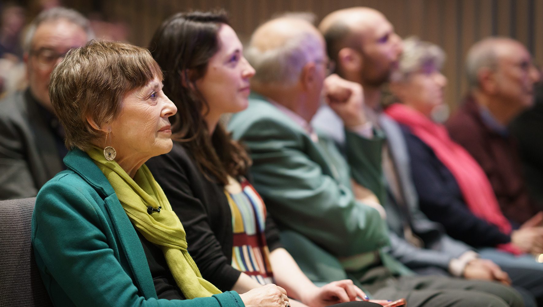 Dr. Edie Friedman, founder of JCORE, and her daughter Anna Isaacs listen to speakers during the HIAS+JCORE event