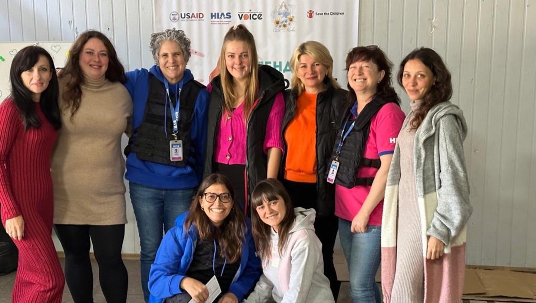 Former HIAS Ukraine Country Director Erika Alfageme poses with representatives of Power of Women in Donetsk.