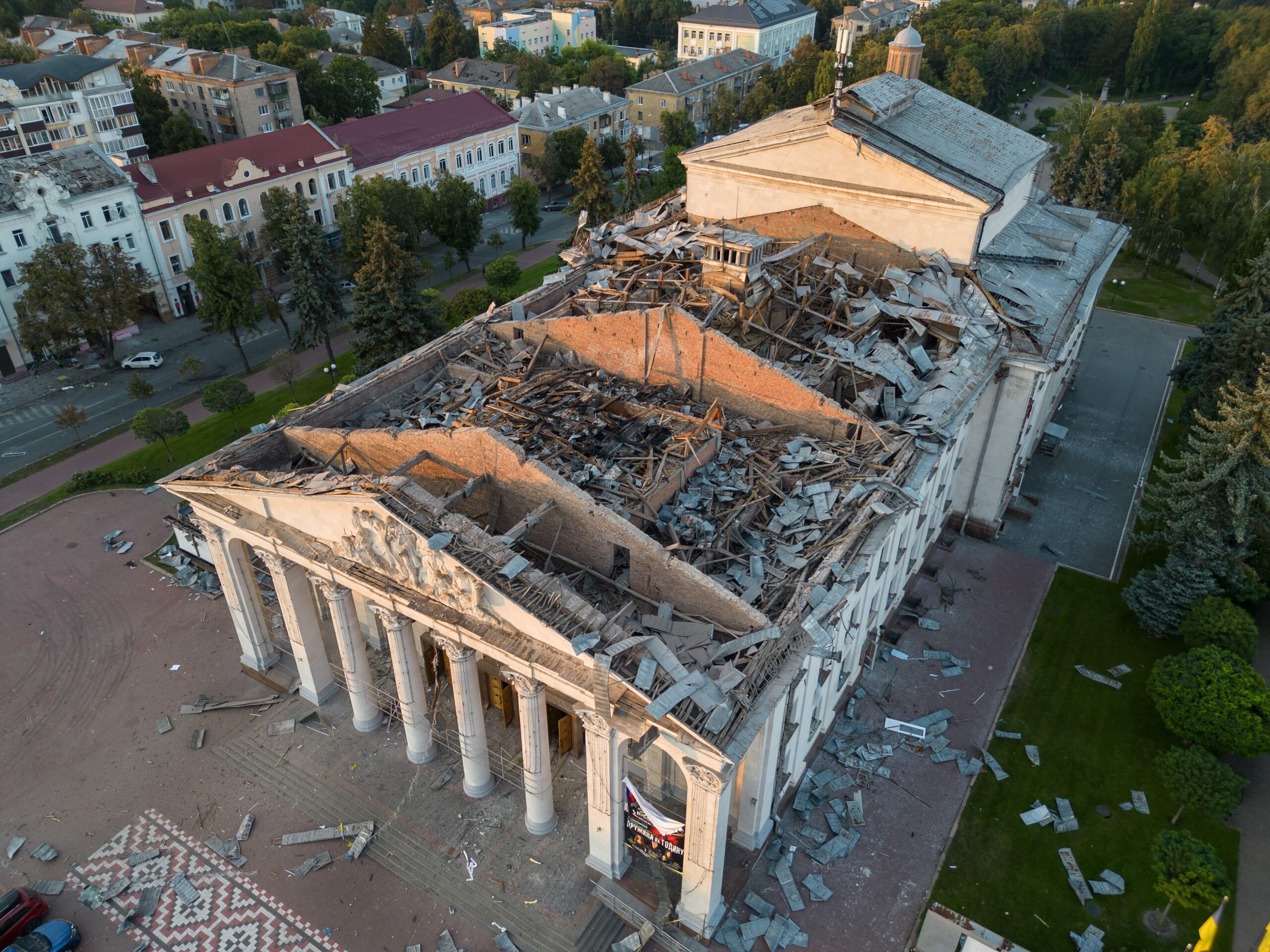 Damage is seen from a late morning missile attack hitting the Chernihiv Regional Academic Ukrainian Music and Drama Theater that killed 7 people, injuring 129, on August 19, 2023 in Chernihiv, Ukraine. | R2P Worker Among Those Killed in Ukraine Missile Attack | HIAS
