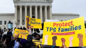 Temporary Protected Status (TPS) holders and advocates rally as the Supreme Court prepares to hear oral arguments in Mullin v. Doe on Wednesday, April 29, 2026, in Washington, D.C. The Supreme Court in June ruled that the Trump Administration may terminate TPS designations for Haitians and Syrians, which could lead to the removal of legal status for 1.3 million people. (Bill Clark/Getty Images)