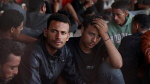 Asylum seekers, who were rescued off the Greek islands of Crete and Gavdos, arrive at the port of Lavrio in Lavreotiki, Greece, on July 10, 2025. (Costas Baltas/Anadolu via Getty Images)