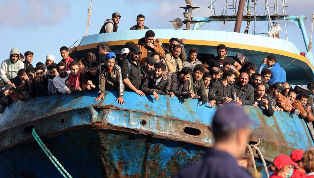 refugees crowded on a boat