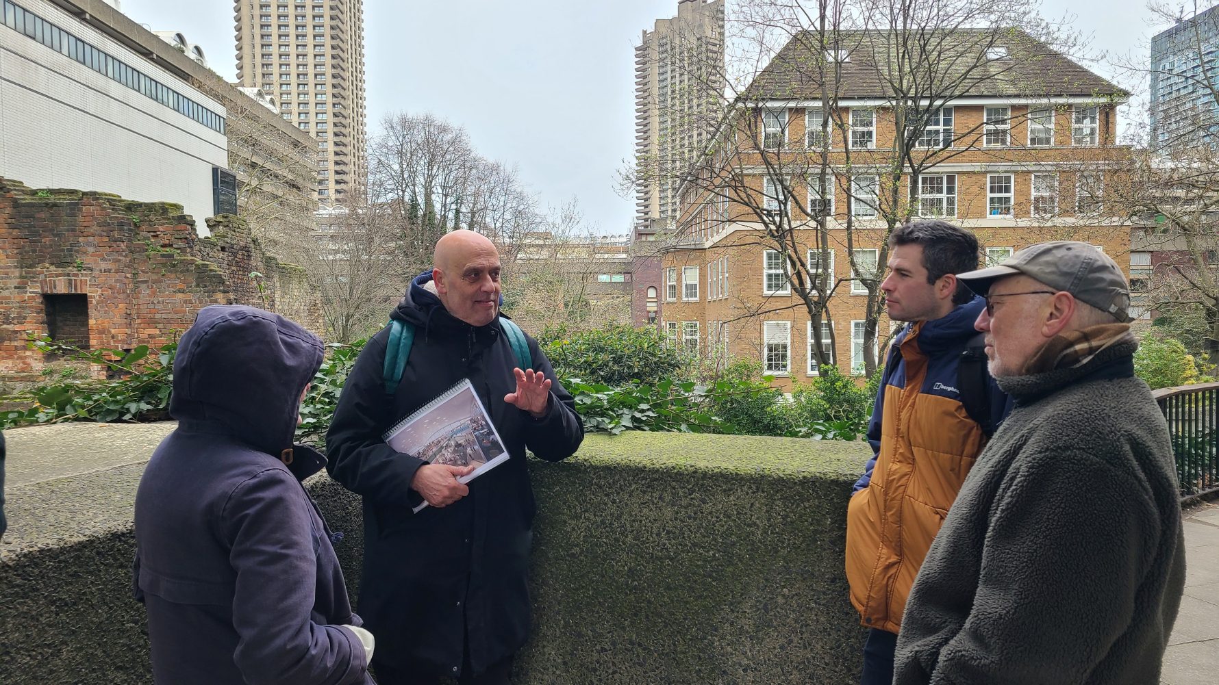 HIAS+JCORE supporters join a tour led by Paul Lincoln about architecture designed by refugees and immigrants in London in honor of Refugee Shabbat on March 13, 2026 (Jennie van den Boogaard/HIAS).