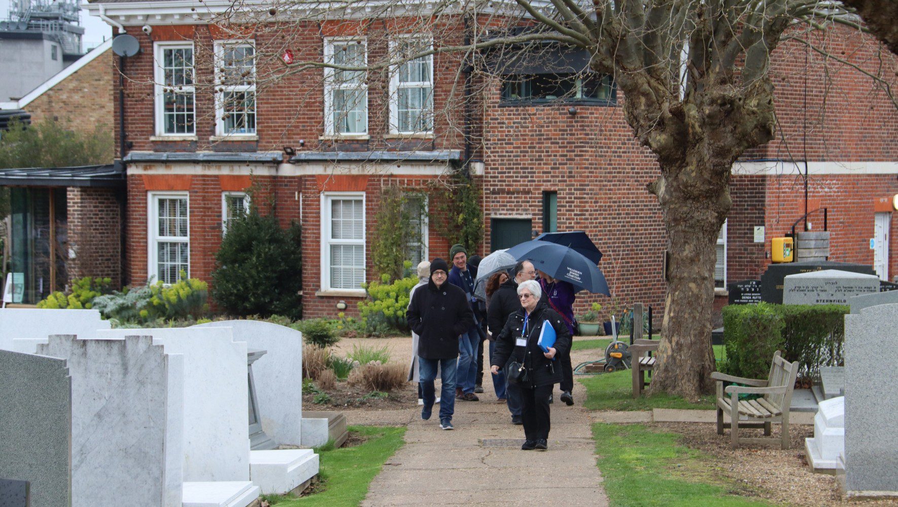 Refugee supporters attend a Refugee Shabbat event at Willesden Jewish Cemetery, including a tour of Jewish immigrants and refugees buried at the cemetery on March 15, 2026, in London. (Stan Kaye/Willesden Jewish Cemetery)