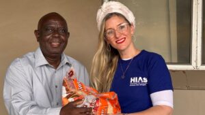 HIAS South Africa Country Director Alana Pugh-Jones Baranov delivers food parcels to Gaby, a refugee community leader on June 19, 2026, in Durban.