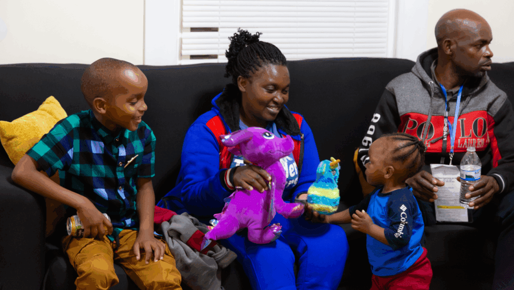 A family of eight are resettled by HIAS partner JFS of Western Massachusetts in July 2025. Their arrival came as a result of a lawsuit that HIAS and other plaintiffs filed against the Trump administration on its pausing of refugee resettlement. (Lindsay Kagalis/HIAS)