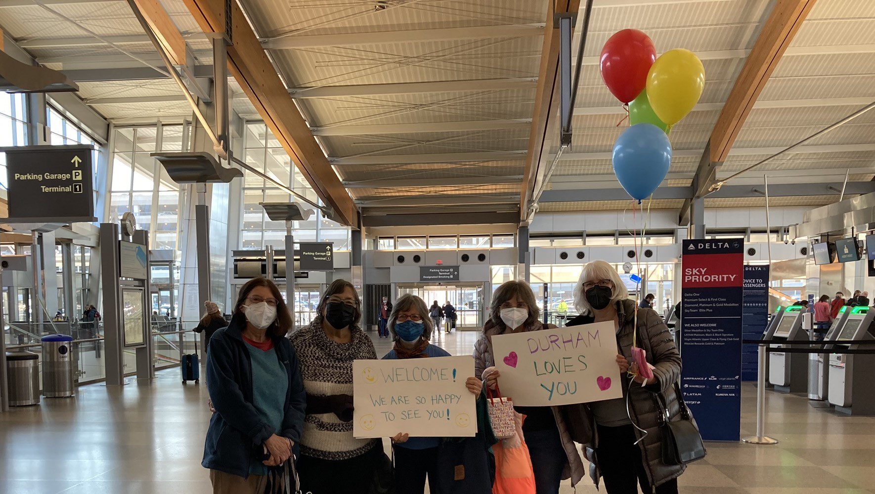 Members of the Judea Reform Congregation, a HIAS Welcome Circle, wait to welcome an Afghan family at Raleigh-Durham International Airport in North Carolina on February 14, 2022. (Marian Abernathy)