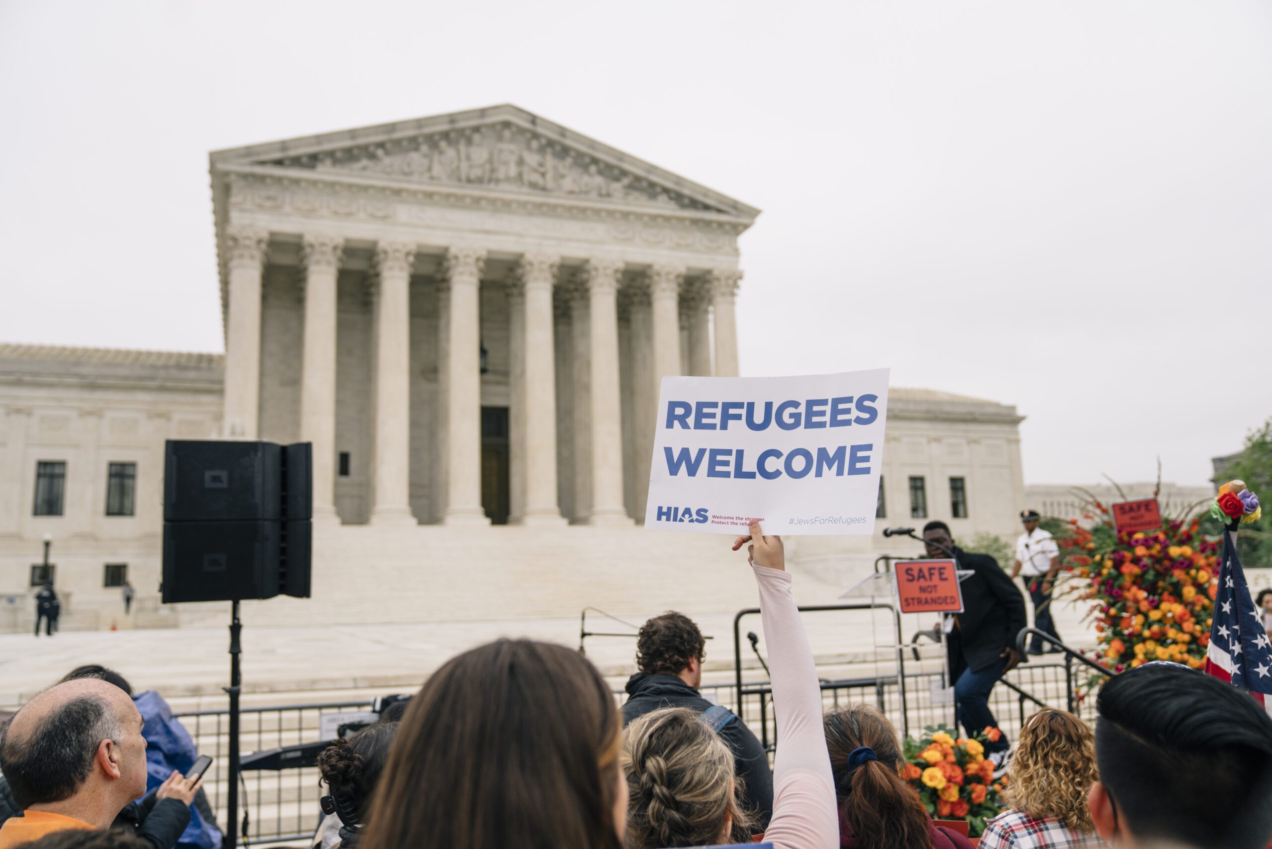 Staff and supporters of HIAS attend the Safe Not Stranded Rally in front of the Supreme Court of the United States in Washington, D.C., on Tuesday, April 26, 2022.