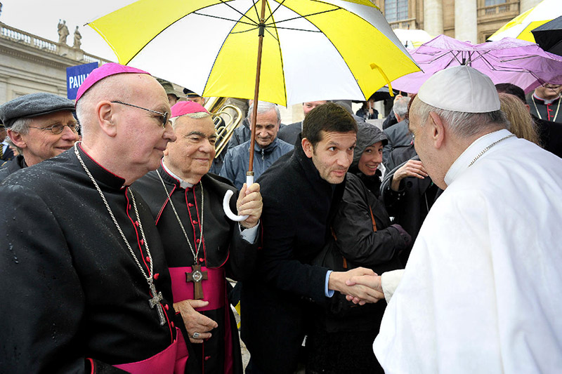 Waiting in the Rain for the Pope