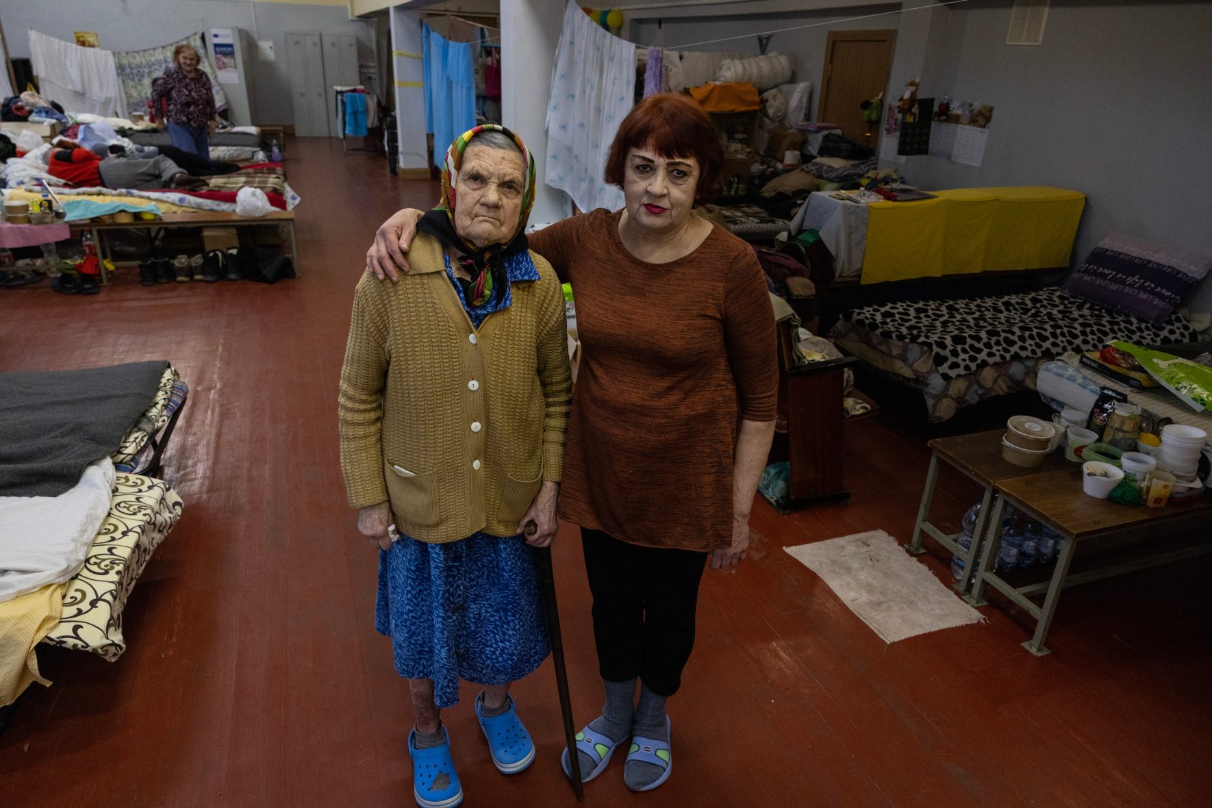 Internally displaced Ukrainians pose at a shelter in Lviv, Ukraine.