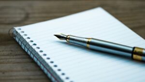 A notebook and pen